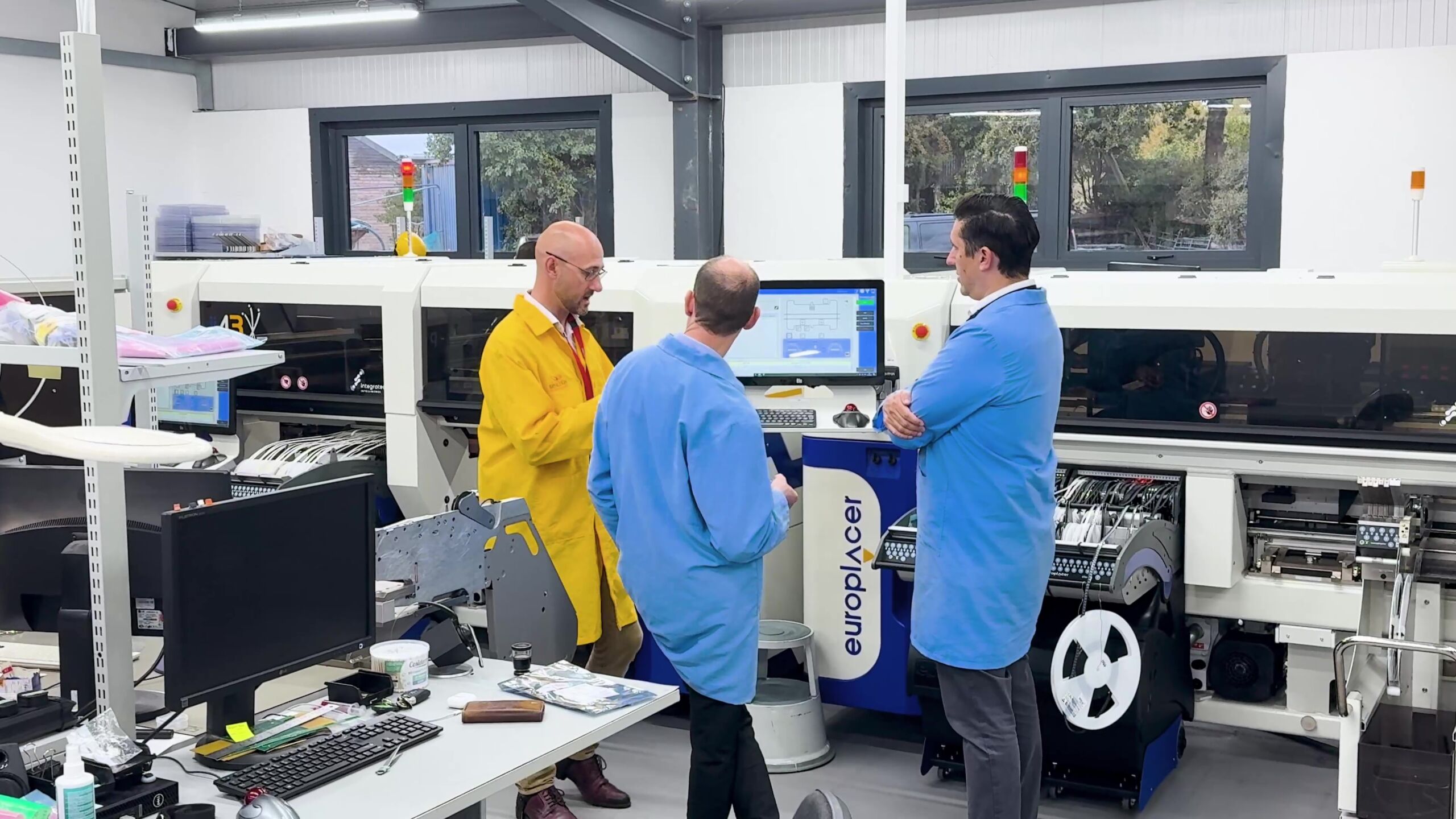 Richard Apthorp and Andrew Breeze from Brynleigh, talking with Elliot Loven from Europlacer